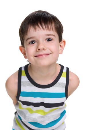 A portrait of a happy little boy on the white backgroundの写真素材