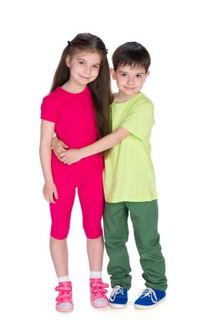 Two smiling children stand togetherの写真素材