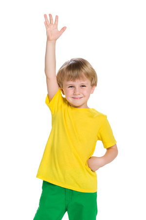 A portrait of a happy little boy against the white backgroundの写真素材