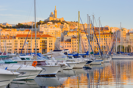 Yachts in the port of Marseille at sunset timeの写真素材