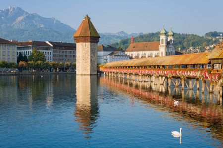 View on Chapel Bridge and Water Tower in Luzern in the morningの写真素材