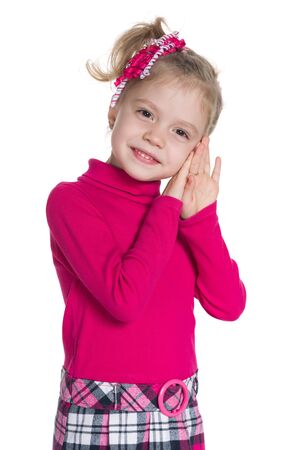 A portrait of an adorable little girl on the white backgroundの写真素材