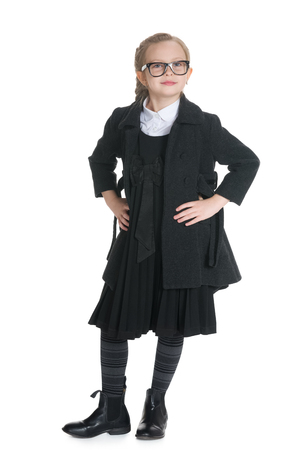 A portrait of a clever little girl on the white backgroundの写真素材