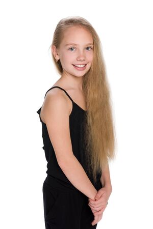 A profile portrait of a girl with flowing hair on the white backgroundの写真素材