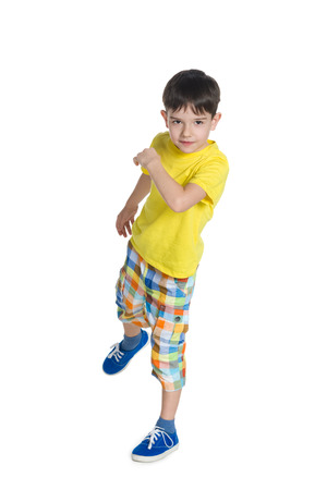 A portrait of a cute little boy on the white backgroundの写真素材