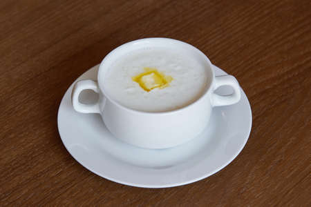 rice porridgeon milk with butterの写真素材