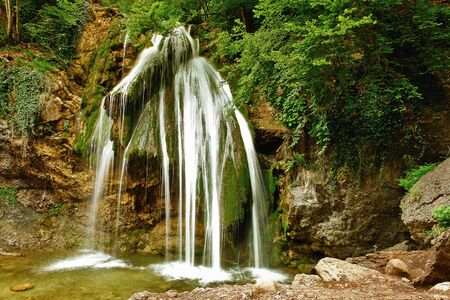 Beautiful waterfall Djur-Djur in forest, Crimea, Ukraineの写真素材