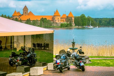Panoramic view on Medieval old castle in Trakai, Lithuania placed on Galve lake Island ancient castle are one of the most popular touristic destinations and cultural center in Lithuania のeditorial素材