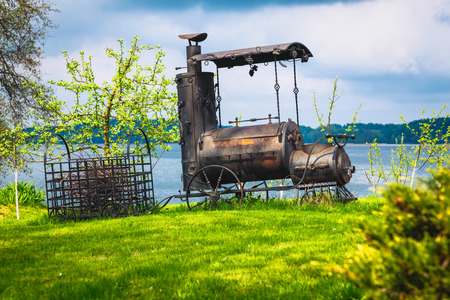 Miniature model or concept of a steam smoking coal train which transporting treeの写真素材