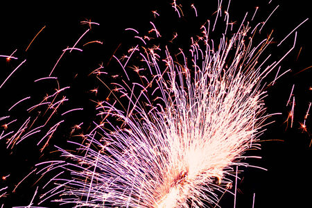 Fire sparks on a black backgroundの写真素材