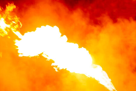 Flames or fire with smoke on midnightの写真素材