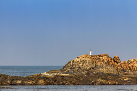 View from beach in Goa to Arabian sea. Rock near seaの写真素材