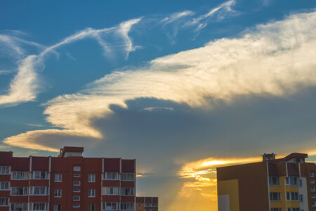 Clouds on blue sky background at sunsetの写真素材