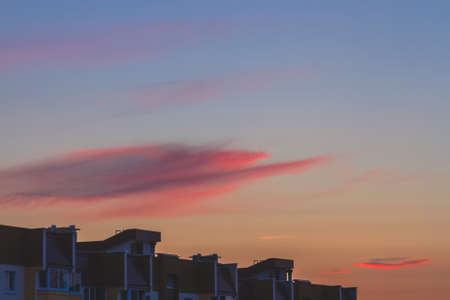 Clouds on sky background at sunsetの写真素材