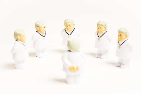 Doctors characters on white background. Medical negotiation or consulting conceptの写真素材