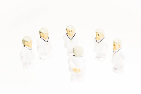 Doctors characters on white background. Medical negotiation or consulting conceptの写真素材