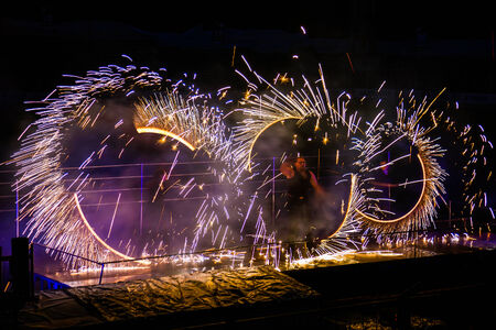 Minsk, Belarus - MAY 25, 2013: annual festival fire show "MIFF". Performance of artists on stageの写真素材