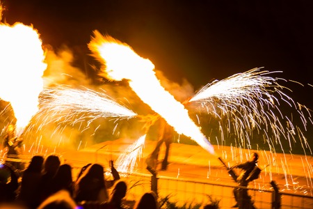 Minsk, Belarus - MAY 25, 2013  annual festival fire show  MIFF   Performance of artists on stage  Mans with flamethrowersの写真素材
