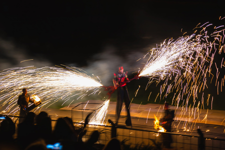 Minsk, Belarus - MAY 25, 2013  annual festival fire show  MIFF   Performance of artists on stage  Mans with flamethrowersのeditorial素材