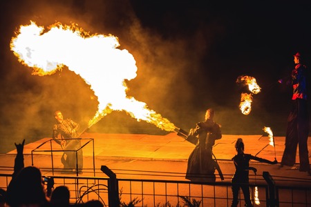 Minsk, Belarus - MAY 25, 2013  annual festival fire show  MIFF   Performance of artists on stage  Mans with flamethrowersのeditorial素材