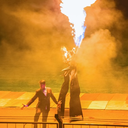 Minsk, Belarus - MAY 25, 2013  annual festival fire show  MIFF   Performance of artists on stage  Man with flamethrowerのeditorial素材