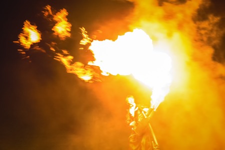 Minsk, Belarus - MAY 25, 2013  annual festival fire show  MIFF   Performance of artists on stage  Man with flamethrowerのeditorial素材