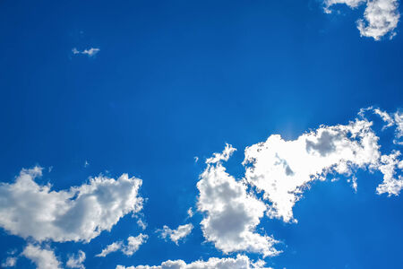 White clouds on blue sky backgroundの写真素材