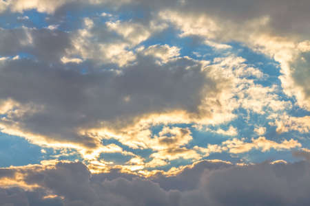 Clouds at sunset on sky backgroundの写真素材
