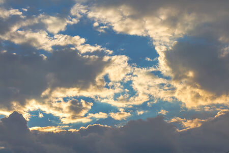 Clouds at sunset on sky backgroundの写真素材