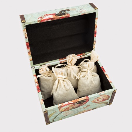 Gift box with textile pouches on white backgroundの写真素材