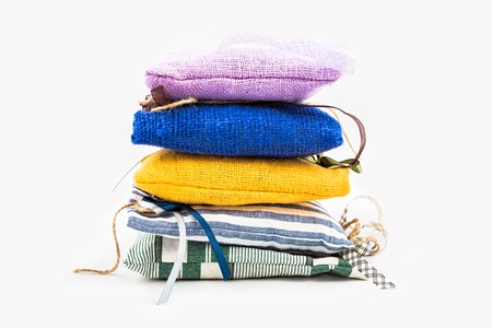 Decorative textile sachet pouches on white backgroundの写真素材
