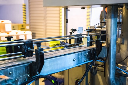 Automatic packing line of conveyor. Pharmaceutical and chemical industry. Manufacture on factoryの写真素材