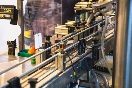 Automatic packing line of conveyor. Pharmaceutical and chemical industry. Manufacture on factoryの写真素材