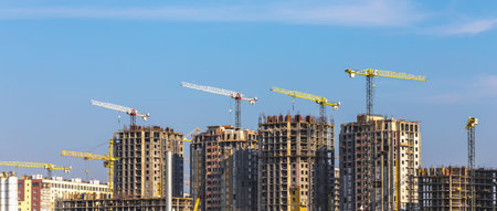 Building cranes on city construction