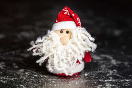Christmas Santa Claus or Father Frost on silver or metal grunge surfaceの写真素材