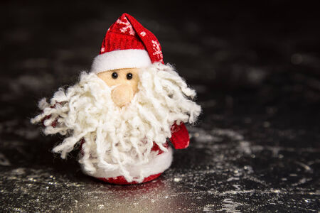 Christmas Santa Claus or Father Frost on silver or metal grunge surfaceの写真素材