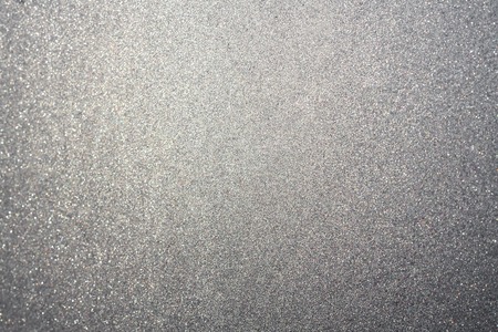 Abstract silver or gray dust or sand background with blur edges of imageの写真素材
