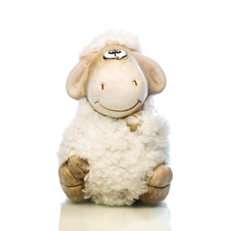 White sheep toy the Chinese symbol of 2015 year on white backgroundの写真素材