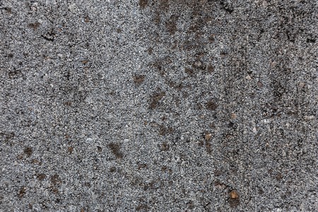 Grunge plaster cement or concrete wall texture dark gray colorの写真素材