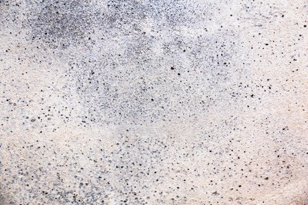 Grunge plaster cement or concrete wall texture white and gray colorの写真素材