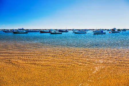 Boats on the water with waves in bay or portの写真素材