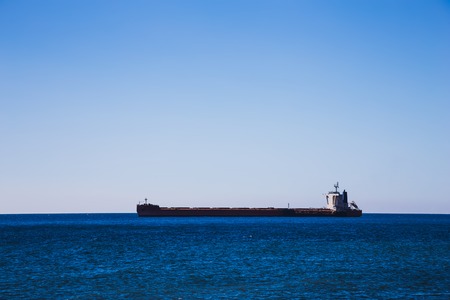 Empty container cargo ship in the open Atlantic oceanの写真素材