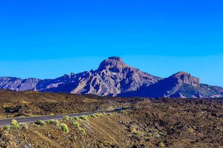 Landscape with Asphalt Road and Mountains on Canary Island in Spainの写真素材