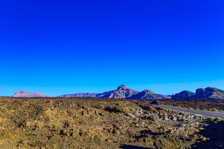 Landscape with Asphalt Road and Mountains on Tenerife Island in Spainの写真素材