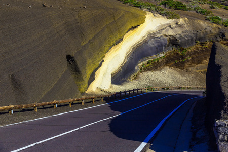Landscape with Asphalt Road and Mountains with Sky on Tenerife Canary Island at Dayの写真素材