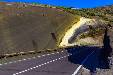 Landscape with Asphalt Road and Mountains with Sky on Tenerife Canary Islandの写真素材