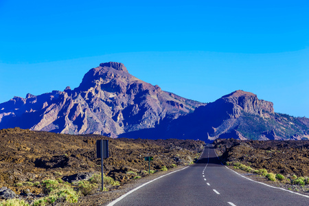 Landscape with Asphalt Road and Mountains on Tenerife Island at Dayの写真素材