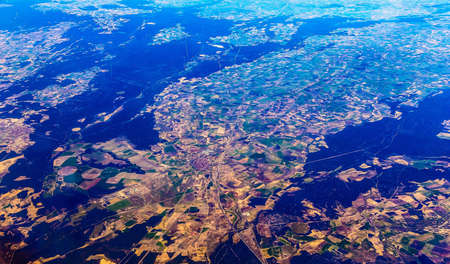 Earth and City Aerial view from Planeの写真素材