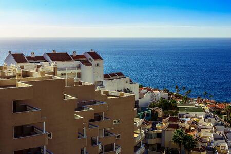 Coast or Shore of Atlantic Ocean with Buildings Seascape on Tenerife Islandの写真素材