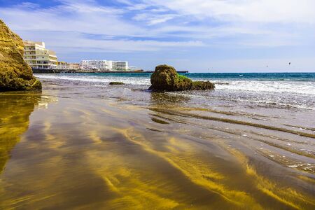 Sand Beach Coast or Shore of Atlantic Ocean with Buildings Landscape on Tenerife Canary Island in Spainの写真素材